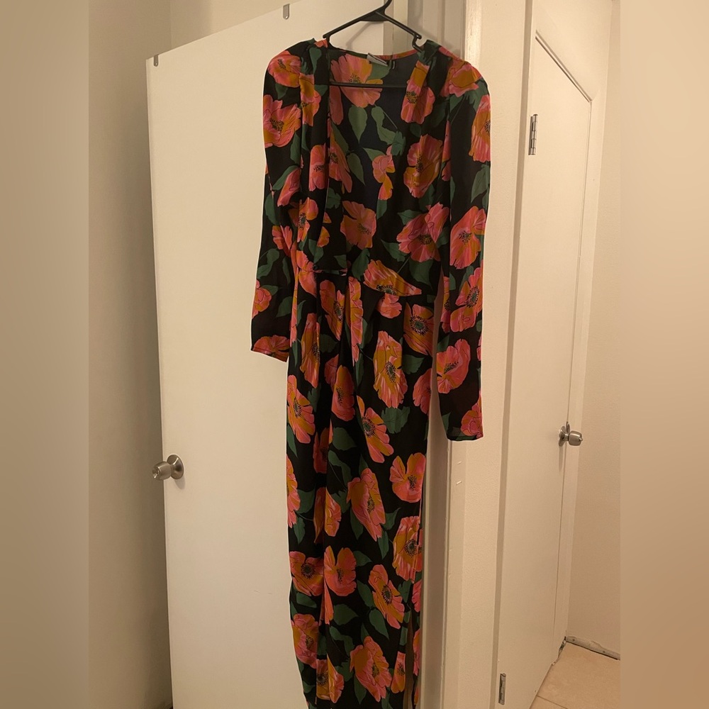 Floral romper. Brand new.